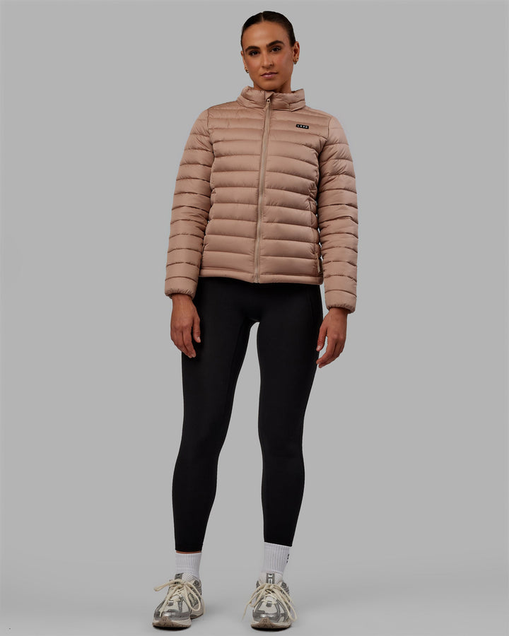 Woman wearing All Day Puffer Jacket - Desert
