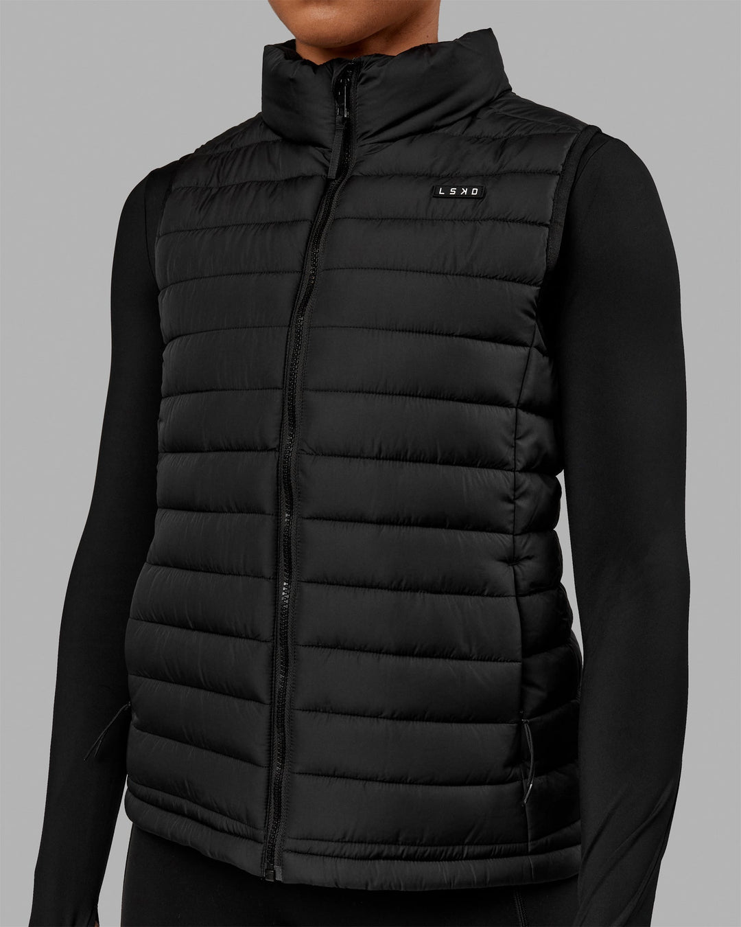 Woman wearing All Day Puffer Vest - Black