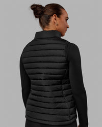 Woman wearing All Day Puffer Vest - Black | Thumbnail Index: 2