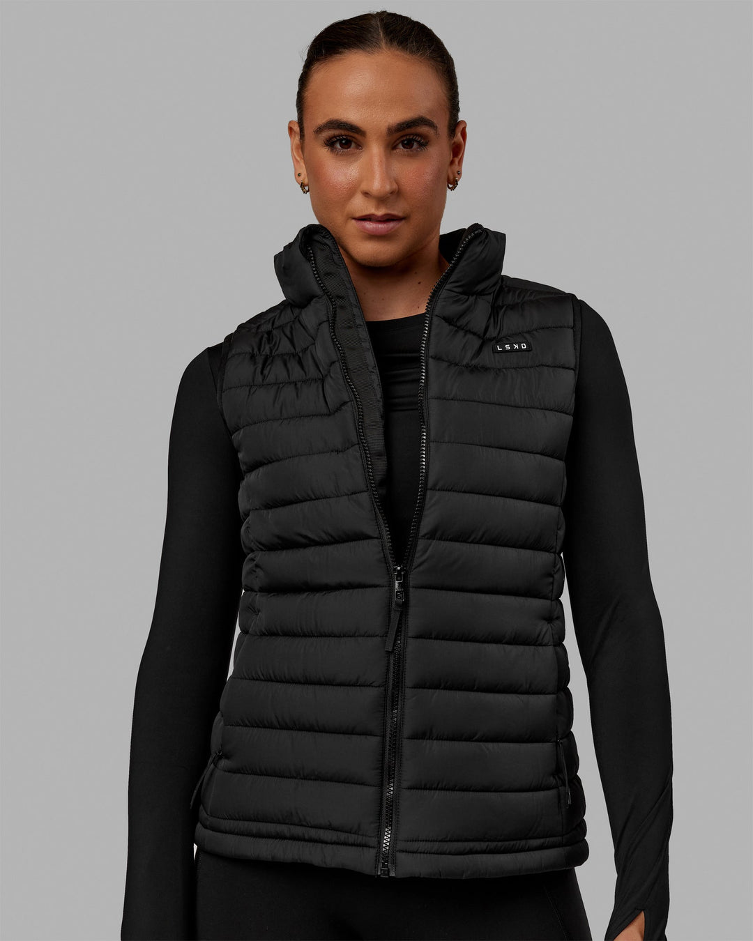 Woman wearing All Day Puffer Vest - Black