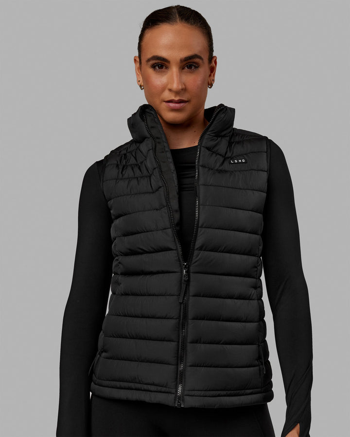 Woman wearing All Day Puffer Vest - Black
