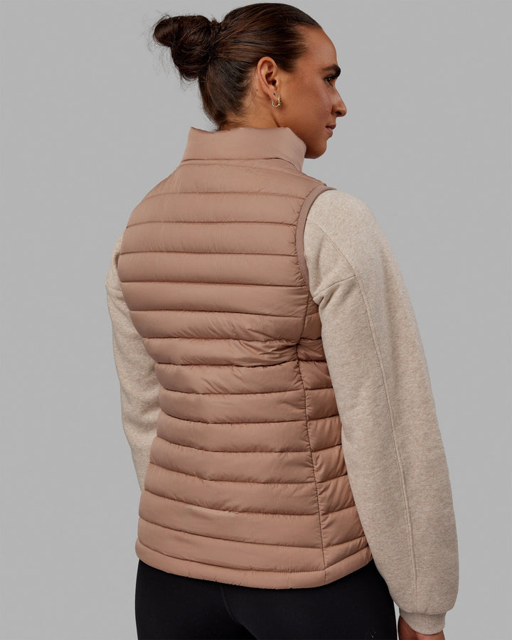 Woman wearing All Day Puffer Vest - Desert
