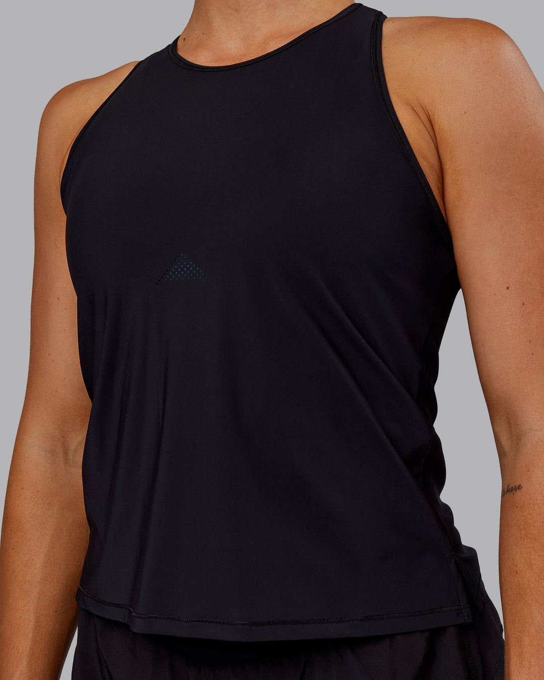 Woman wearing Cadence Tank - Black