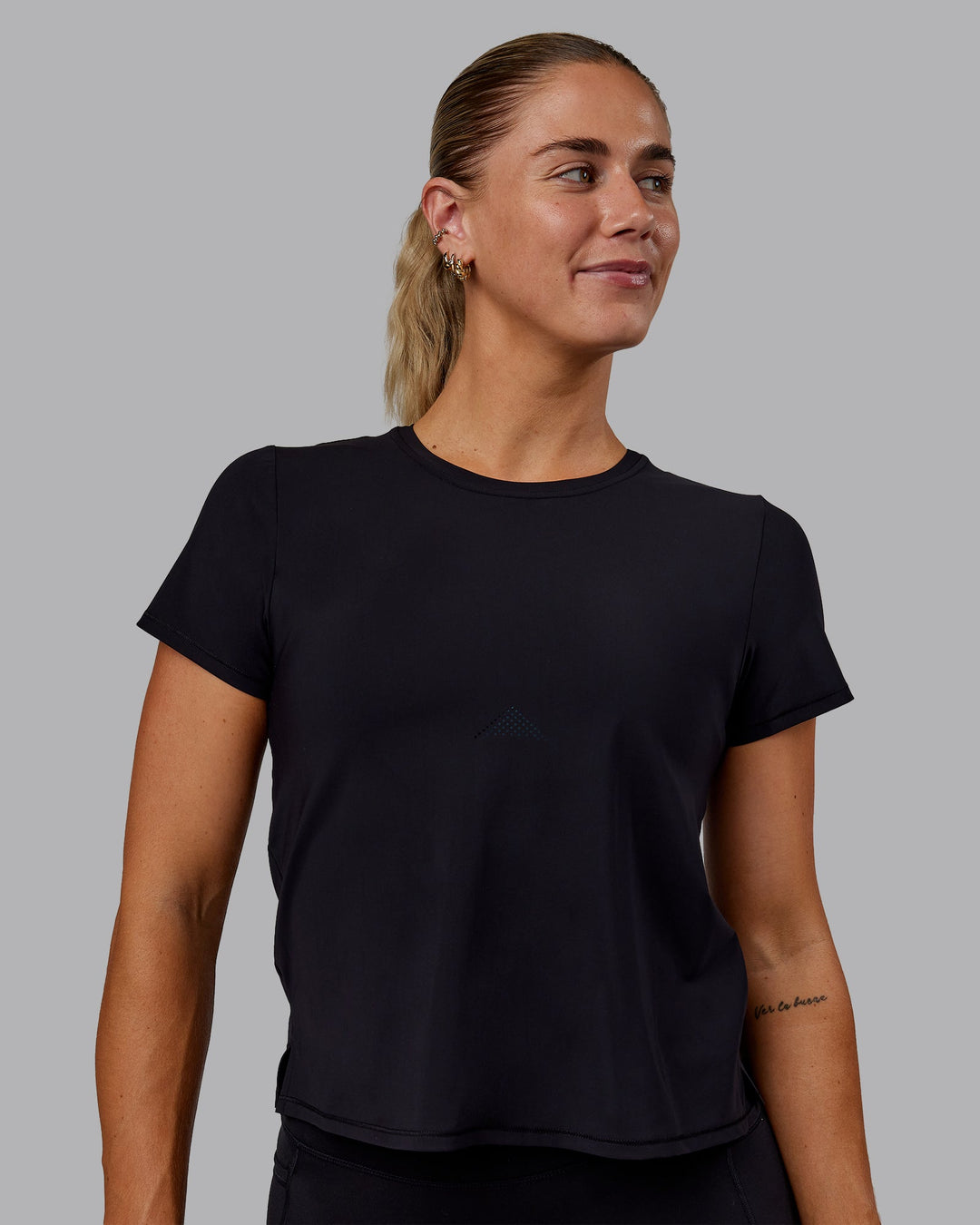 Woman wearing Cadence Tee - Black