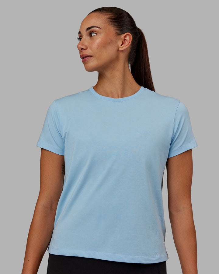 Woman wearing Deluxe PimaFLX Tee - Glacial Blue
