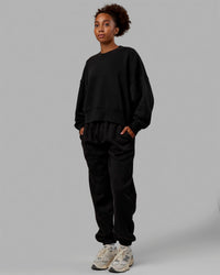 Woman wearing MVP Oversized Sweater - Black | Thumbnail Index: 5