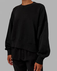 Woman wearing MVP Oversized Sweater - Black | Thumbnail Index: 3