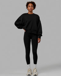 Woman wearing MVP Oversized Sweater - Black | Thumbnail Index: 6