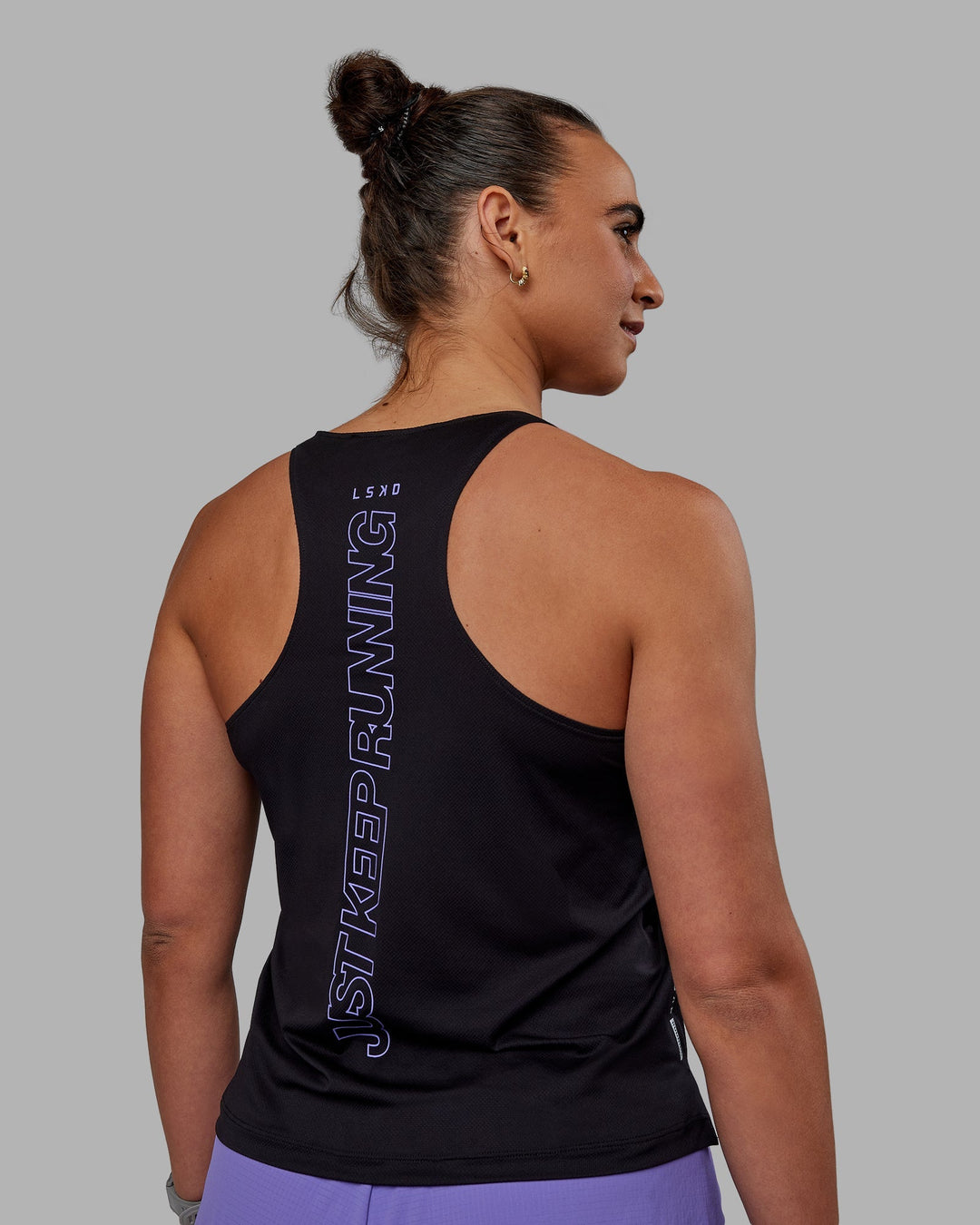 Woman wearing Pace Keep on Running Tank - Black-Dahlia Purple