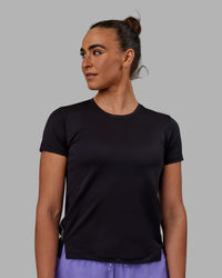 Woman wearing Pace Keep on Running Tee - Black-Dahlia Purple