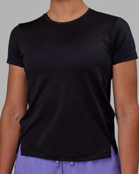 Woman wearing Pace Keep on Running Tee - Black-Dahlia Purple