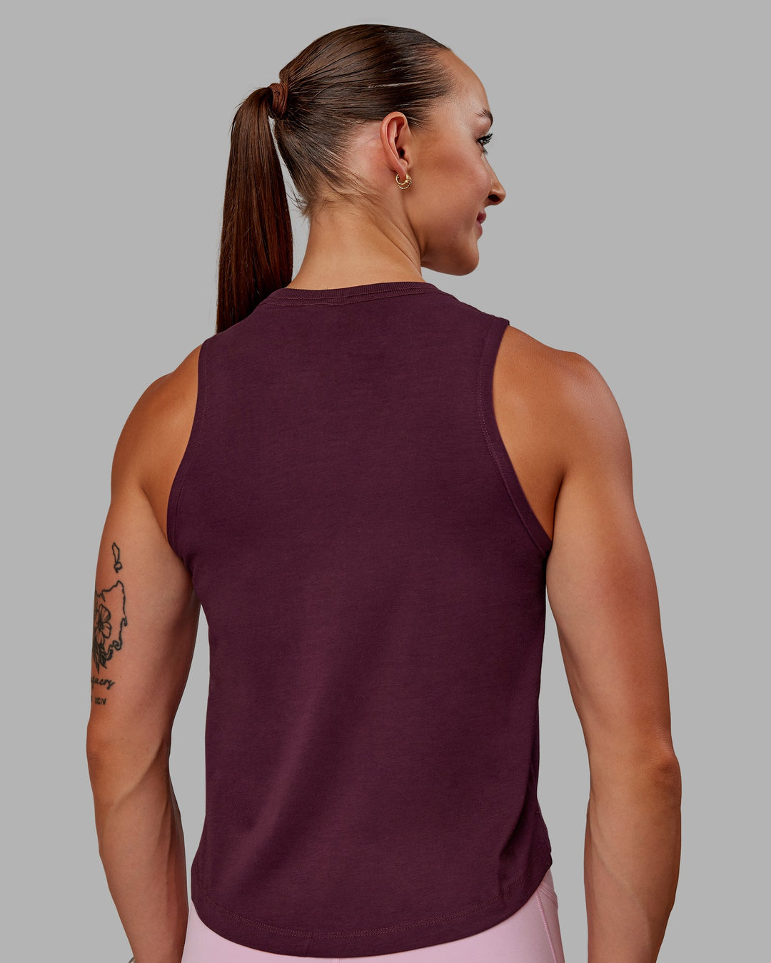 Woman wearing Deluxe PimaFLX Tank - Cherry Lacquer