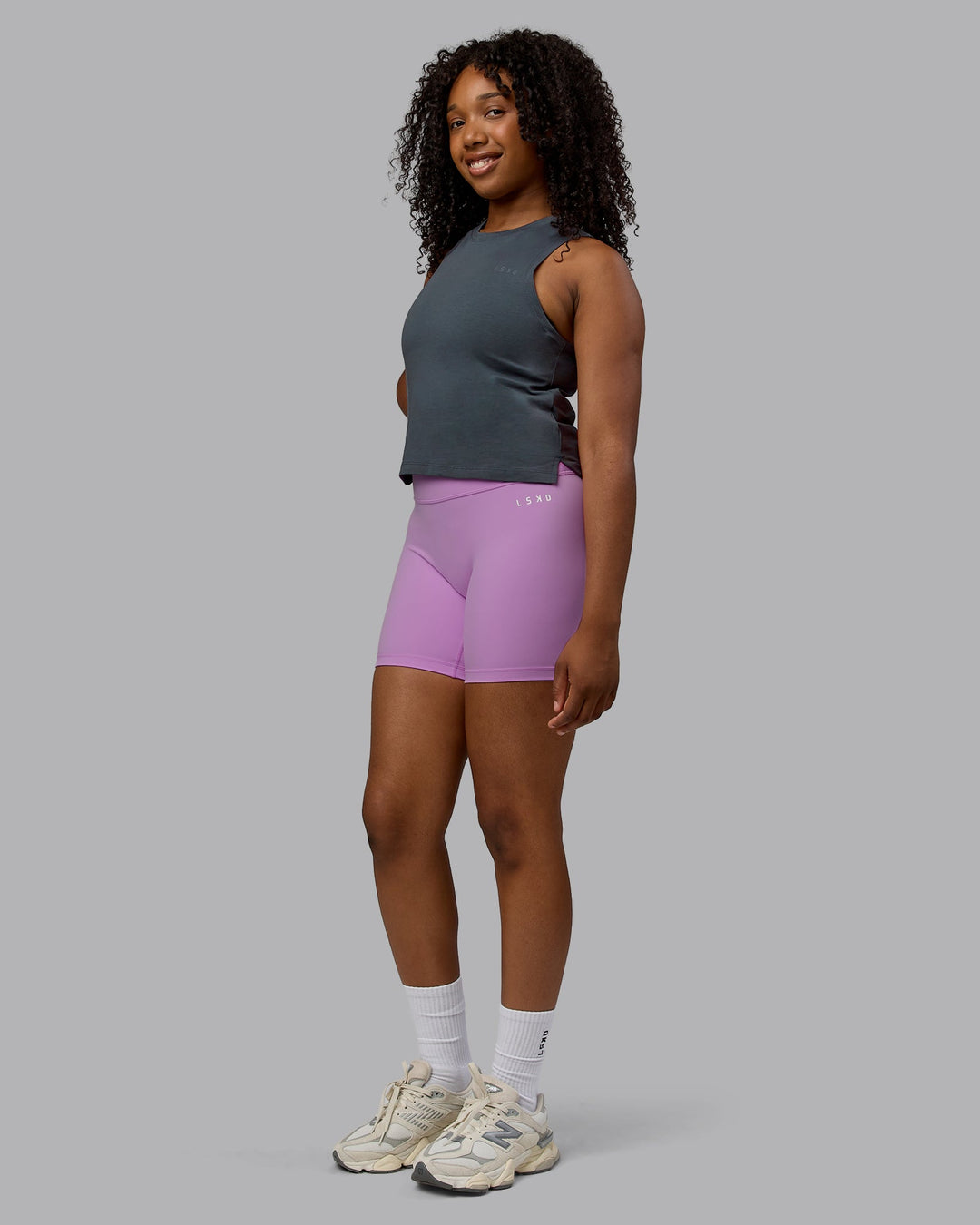 Woman wearing Deluxe PimaFLX Tank - Turbulence