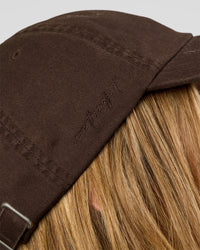 Woman wearing CF Move Through Cap - Hot Chocolate | Model:Leilani | Size:OS