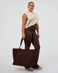 Woman wearing CF Move Through Tote - Hot Chocolate | Model:Simmy