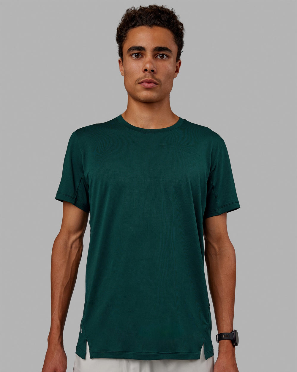 Man wearing Pace Running Tee - Dark Moss