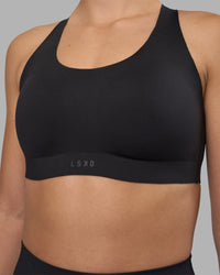 Woman wearing Stability Sports Bra - Black | Model:Charlize | Size:S (A-C Cup) | Thumbnail Index: 7