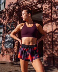 Woman wearing Accelerate 3" Running Short - Inferno Print | Model:Leah | Size:S