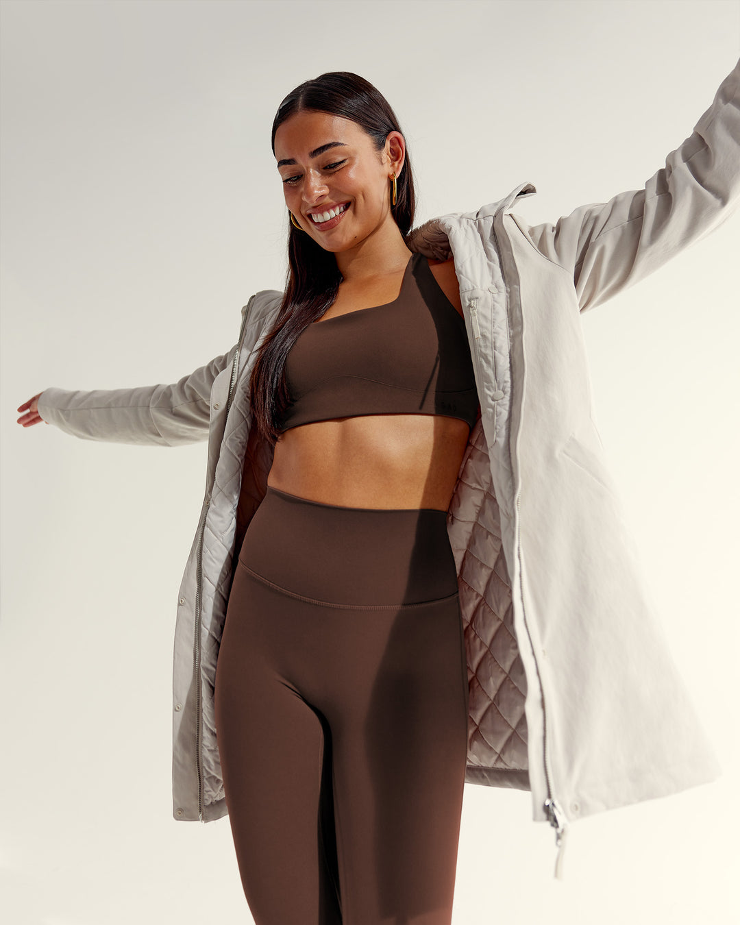 Woman wearing Auxiliary 2.0 Jacket - Shale Beige | Model:Ruby | Size:S