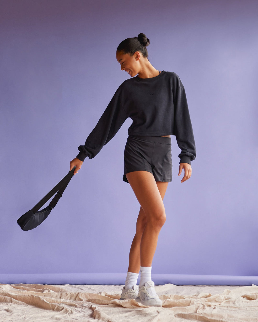 Woman wearing Breeze Open Back Sweater - Black-Black | Model:Tali | Size:S