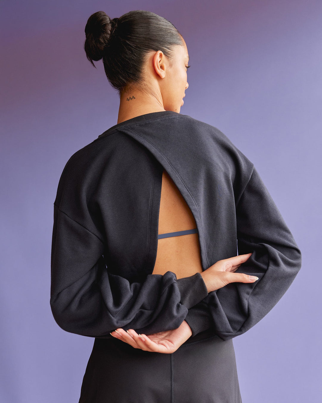 Woman wearing Breeze Open Back Sweater - Black-Black | Model:Tali | Size:S