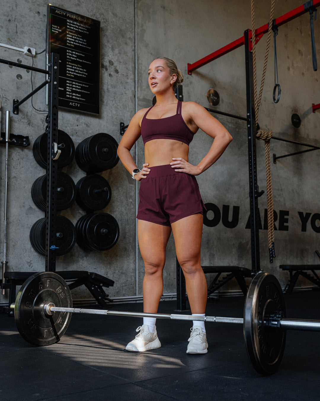 Woman wearing Challenger 3&quot; Lined Performance Short - Cherry Lacquer | Model:Lyss | Size:S