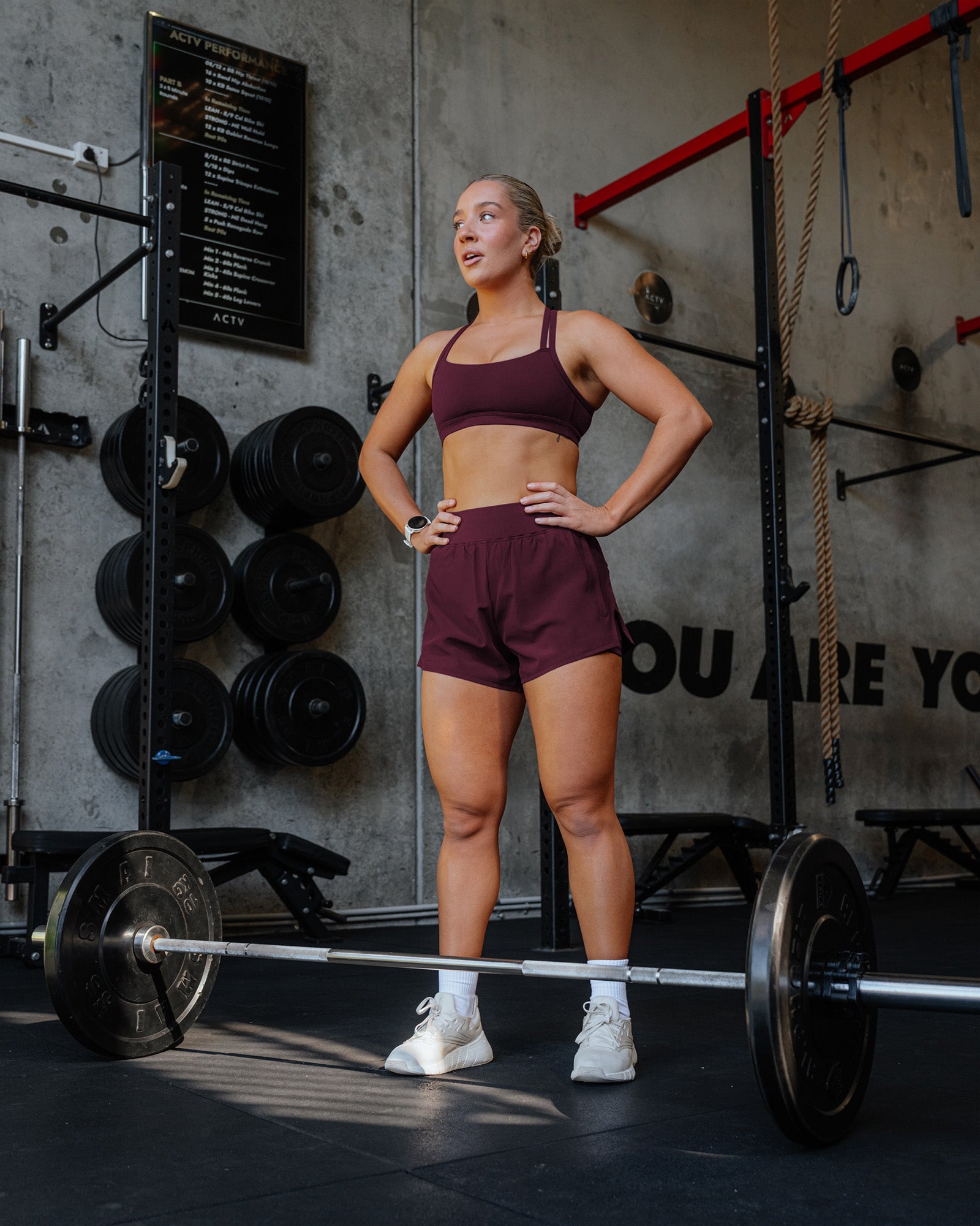 Woman wearing Challenger 3" Lined Performance Short - Cherry Lacquer | Model:Lyss | Size:S