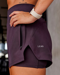 Woman wearing Challenger 3" Lined Performance Short - Midnight Plum | Model:Roisin | Size:S