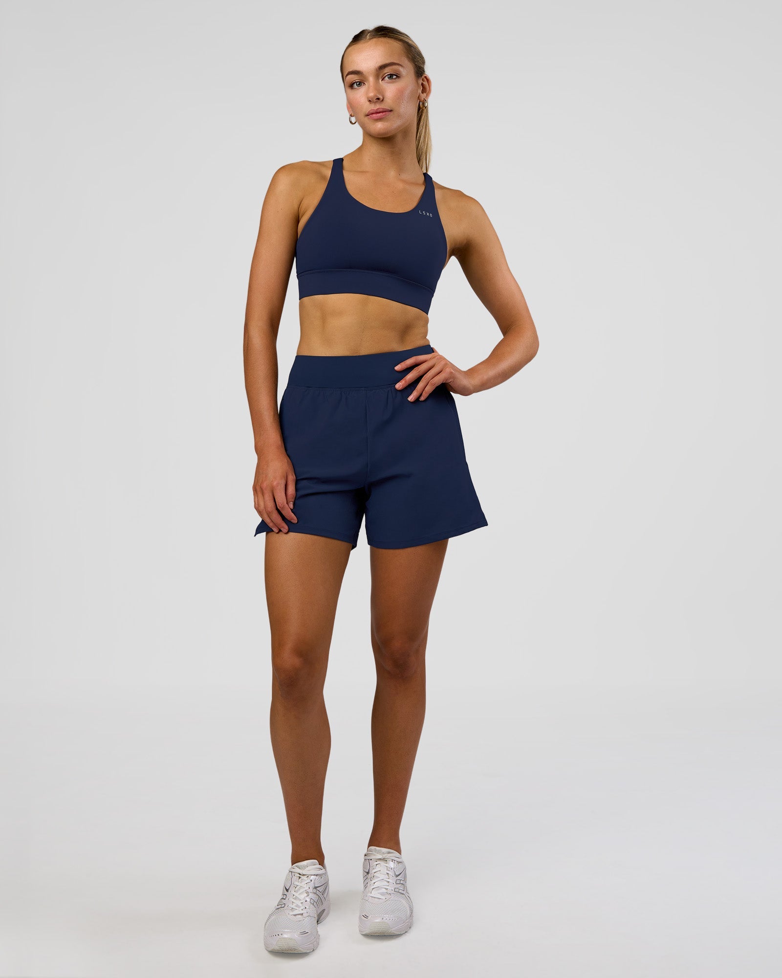 Woman wearing Challenger 5" Lined Performance Short - Future Navy | Model: Evie | Size:S