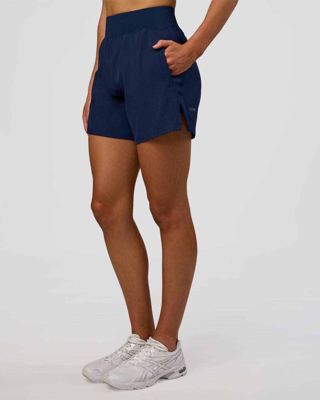 Woman wearing Challenger 5" Lined Performance Short - Future Navy | Model: Evie | Size:S