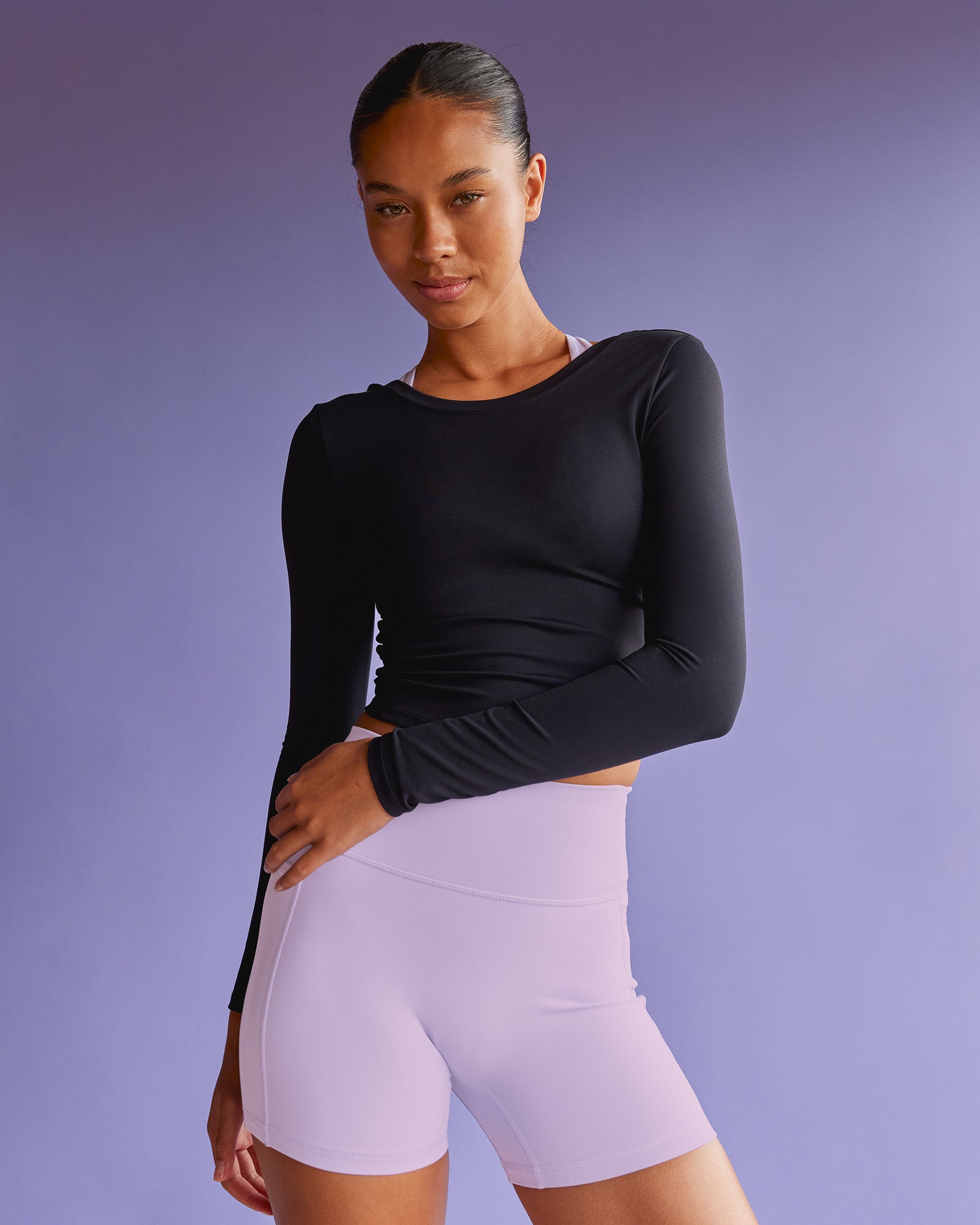 Woman wearing Effortless Long Sleeve Top - Black | Model:Tali | Size:S