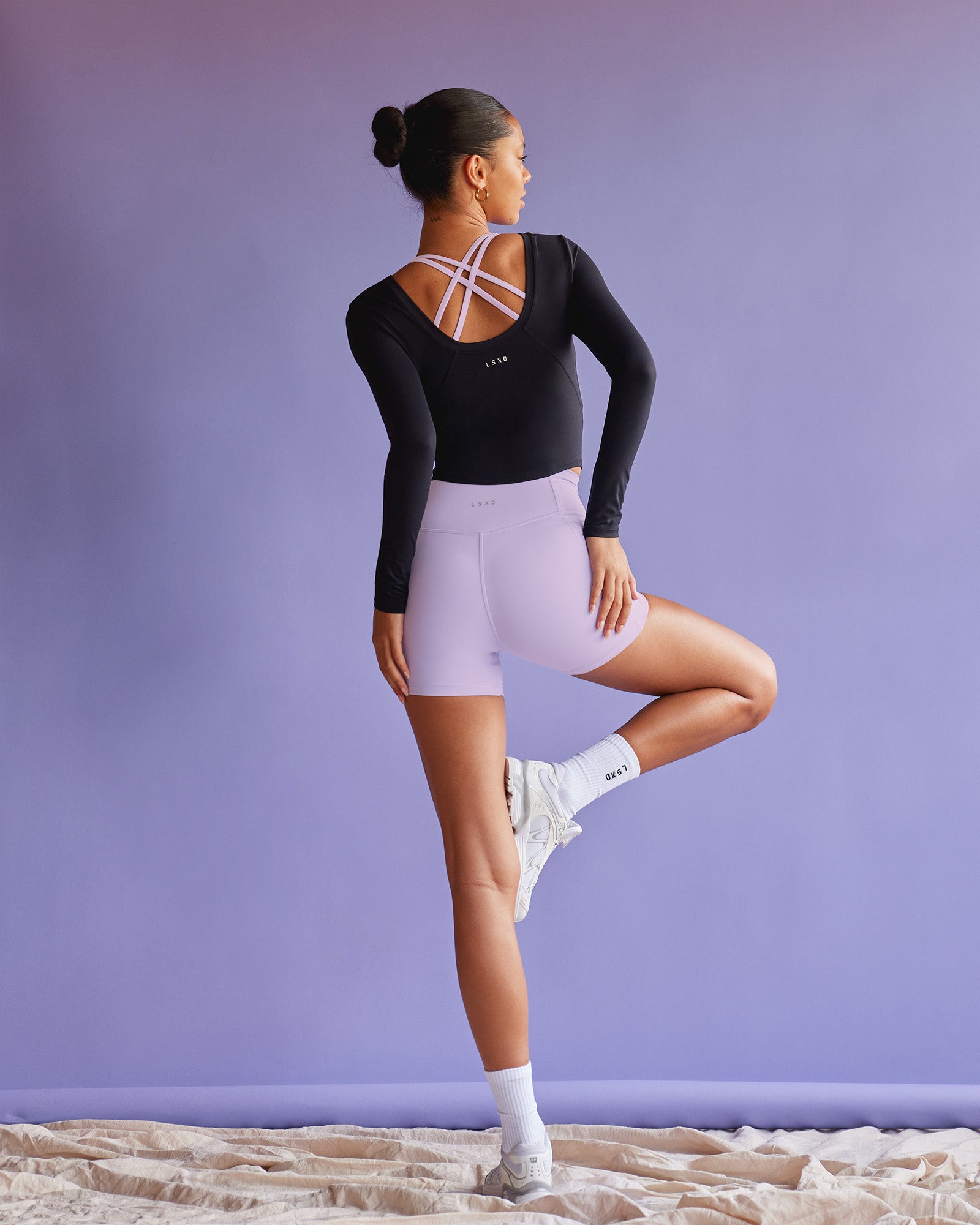 Woman wearing Effortless Long Sleeve Top - Black | Model:Tali | Size:S