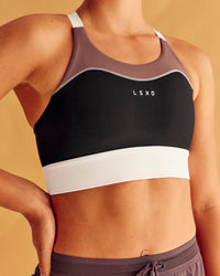 Woman wearing Elevated Accelerate Sports Bra - Black-Multi | Model:Charlize | Size:S | Thumbnail Index: 3