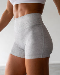 Woman wearing Enhance Ultra High-Rise 4" Short - Grey Marl | Model:Emily | Size:S