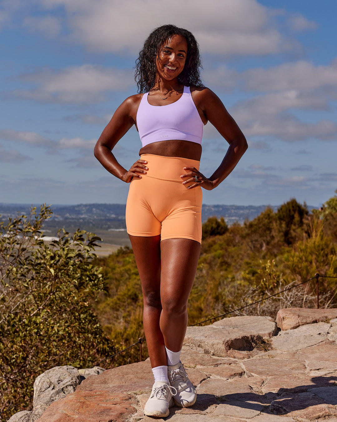 Woman wearing Fusion Sports Bra 2.0 - Pale Lilac | Model:Audree | Size:S