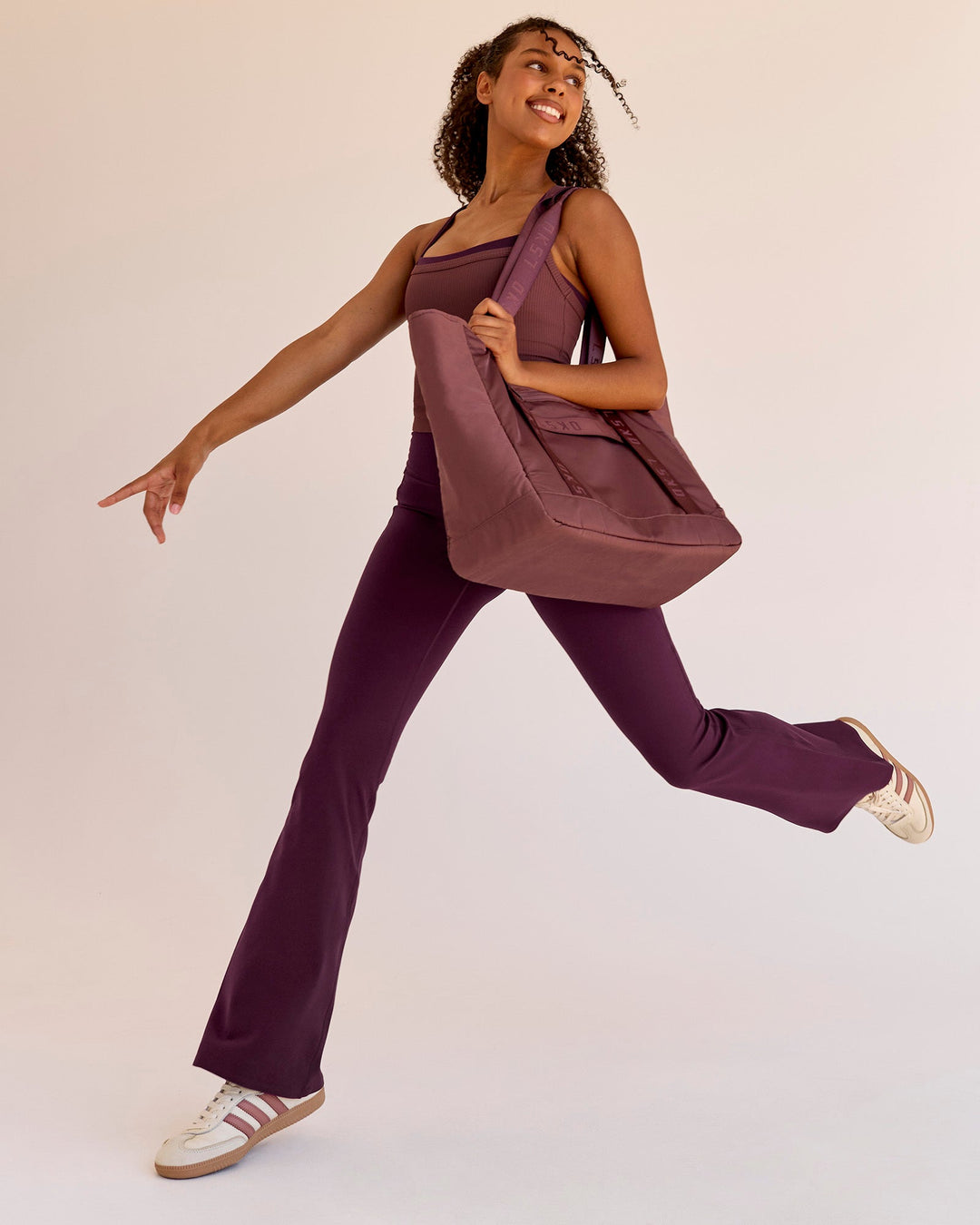 Woman wearing Fusion V-Contour High-Rise Flared Legging Pockets - Cherry Lacquer | Model:Jordan | Size:S - view 6