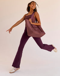 Woman wearing Fusion V-Contour High-Rise Flared Legging Pockets - Cherry Lacquer | Model:Jordan | Size:S | Thumbnail Index: 5