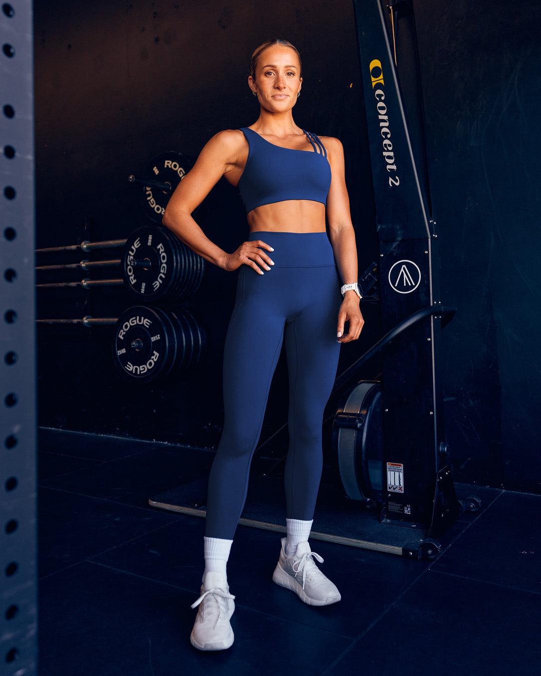 Woman wearing Galvanise Sports Bra 2.0 - Midnight Blue | Model:Dani | Size:S