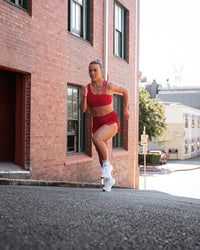 Woman wearing Galvanise Sports Bra 2.0 - Scarlet | Model:Trista | Size:S