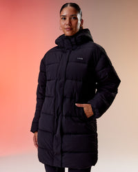 Woman wearing Go-To Puffer Long Jacket - Black | Model:Rhiley | Size:S