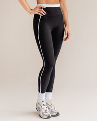 Woman wearing Liberate Contrast High-Rise Full Length Legging Pockets - Black-White | Model:Jordi | Size:S