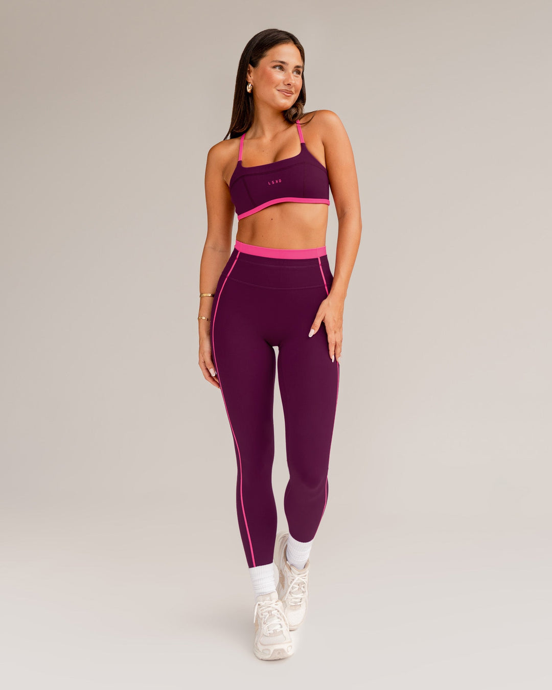 Woman wearing Liberate Contrast High-Rise Full Length Legging Pockets - Plum Caspia-Ultra Pink | Model:Bianca | Size:S