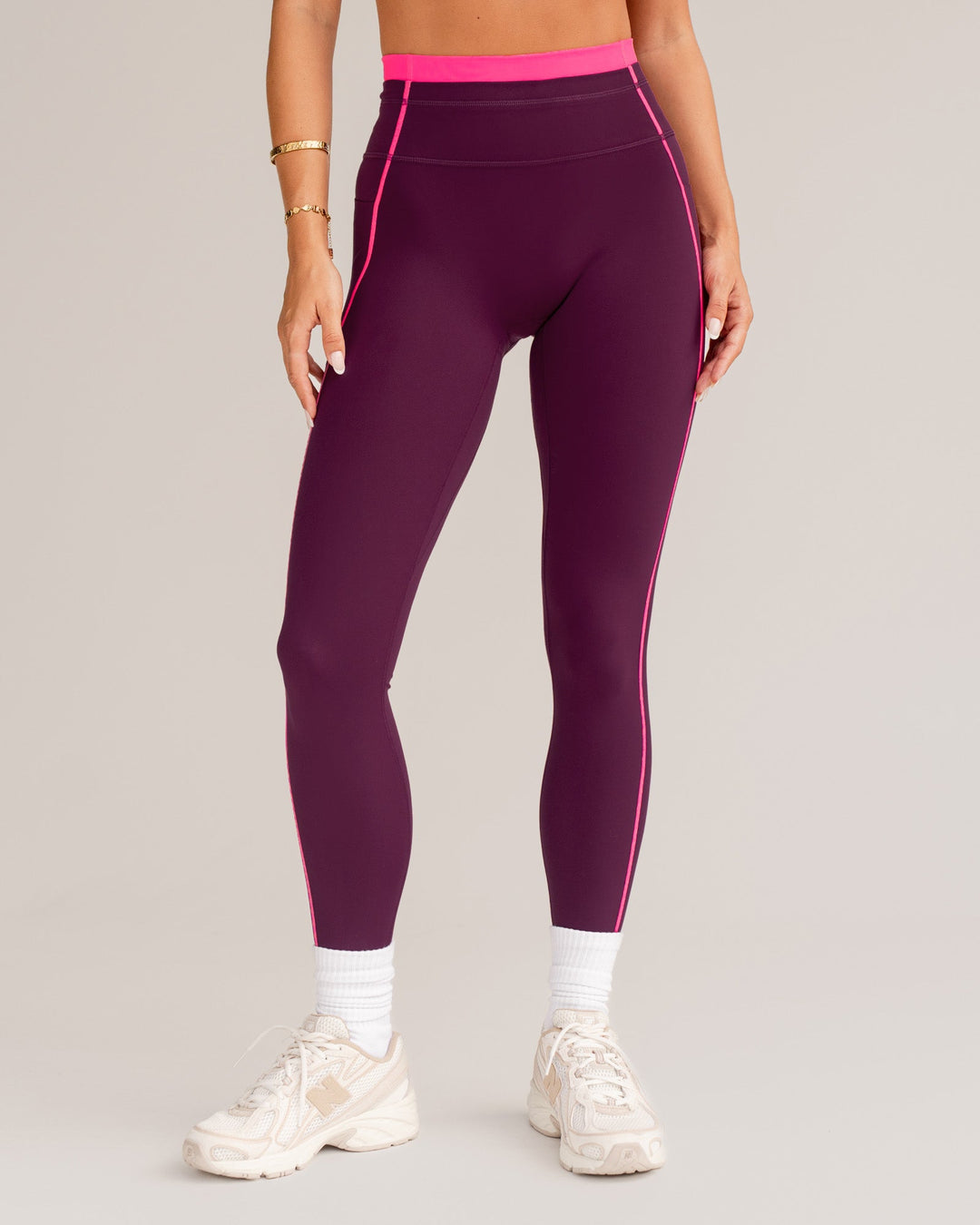 Woman wearing Liberate Contrast High-Rise Full Length Legging Pockets - Plum Caspia-Ultra Pink | Model:Bianca | Size:S