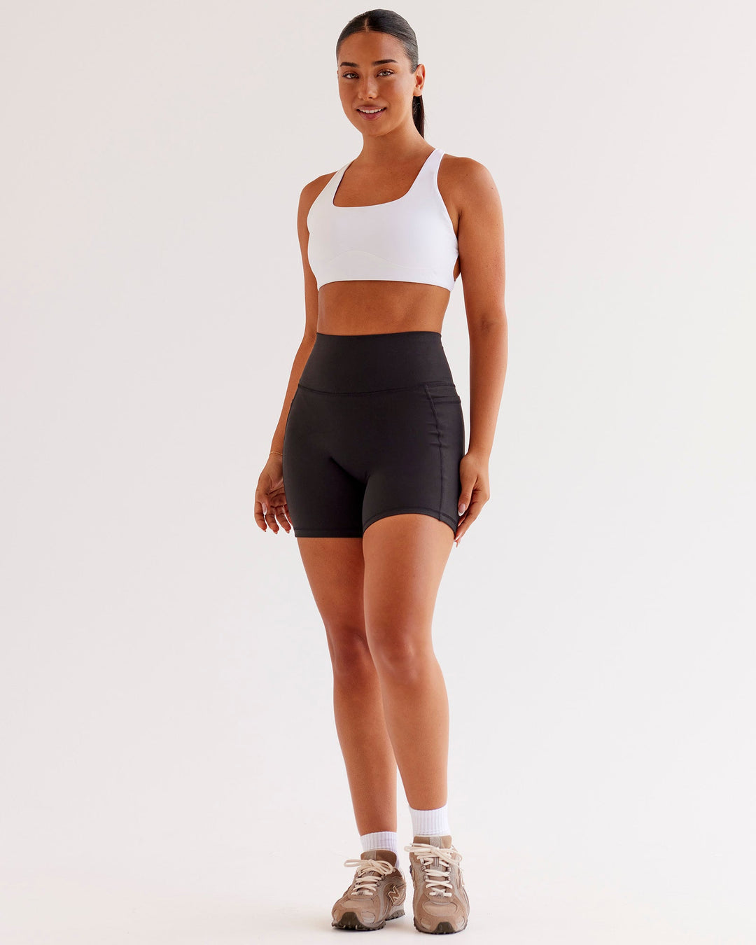 Woman wearing O.G Fusion Ultra High-Rise 6" Short Pockets - Black | Model:Ysabella | Size:S