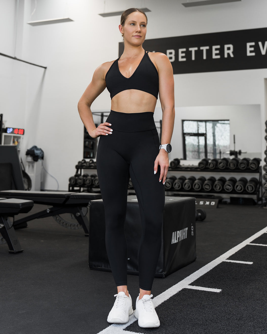 Woman wearing Stamina Pulse Sports Bra - Black | Model:Sarah | Size:S