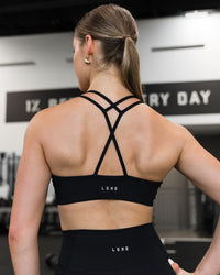Woman wearing Stamina Pulse Sports Bra - Black | Model:Sarah | Size:S | Thumbnail Index: 3