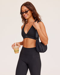 Woman wearing Stamina Sports Bra - Black | Model:Dakota | Size:S | Thumbnail Index: 2