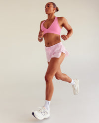Woman wearing Stamina Sports Bra - Candy Pink | Size:S