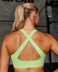 Woman wearing Stamina Sports Bra - Solar Lime | Model:Hannah | Size:S | Thumbnail Index: 1