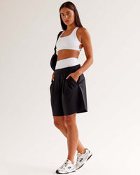 Woman wearing StretchShift Wide Leg Short - Black | Model:Ruby | Size:S | Thumbnail Index: 0